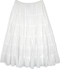 White Ruffled Flared Maxi Skirt, White Voluminous Tiered Maxi Skirt, White Tiered Gathered Maxi Skirt, White Ruffled Full Maxi Skirt, White Cotton Gathered Maxi Skirt, White Cotton Maxi Skirt With Gathered Detail, Flowy Tiered White Skirt, White Cotton Pleated Maxi Skirt, White Relaxed Fit Tiered Maxi Skirt