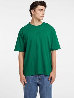 An oversized tee featuring our classic embroidered logo. Crafted in our organic cotton blend. Classic Green Top With Embroidered Logo, Casual Green T-shirt With Embroidered Logo, Relaxed Fit Green Top With Embroidered Logo, Green Relaxed Fit Top With Embroidered Logo, Casual Green Tops With Embroidered Logo, Green Cotton Top With Embroidered Logo, Green Cotton Tops With Embroidered Logo, Green Spring Top With Embroidered Logo, Spring Green Top With Embroidered Logo