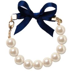 Hand-knotted 10 mm glass Gold plated brass anchor Bow length is 1.5" Bow width 3/8" Navy Satin ribbon Wash pearls gently with warm water and soap 14K gold plated hardware Made in Rhode Island Keil James Patrick, Preppy Accessories, Classy Girls Wear Pearls, Kiel James Patrick, Preppy Bracelets, Cultured Pearl Bracelet, Pearls Bracelet, Wear Pearls, James Patrick