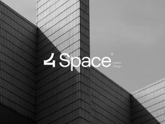 black and white photo of two skyscrapers with the word 4 space in front of them