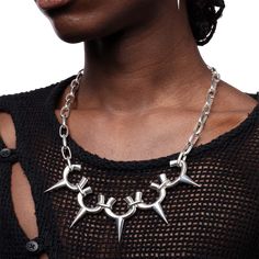 Juanita Care is an independent avant-garde jewelry and vegan accessories born in France, 2017. Punk aesthetic meets artistic freedom, a fusion of fear, desire, revolt, and seduction. Each piece embodies the poetry of evolving bodies. Welcome to a realm where expression knows no bounds. Necklace inspired by the handles of ceramic vases, connected to a chain of rectangular links. Polished 925 silverMaterial: Sterling silver, polished finish,T claspDimensions: Length (open) S — 60cm, M — 70cm Metal Jewelry For Alternative Fashion, Edgy Silver Chain Jewelry For Party, Punk Style Silver Chain For Parties, Handmade Edgy Jewelry For Party, Edgy Handmade Jewelry For Parties, Edgy Metal Jewelry, Modern Metal Jewelry For Festivals, Edgy Metal Jewelry For Alternative Fashion, Alternative Fashion Silver Chain Jewelry