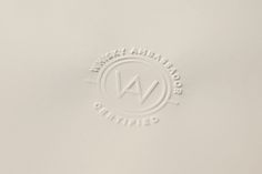 the logo is white and has a circular design on it's bottom half that reads, west amador certified