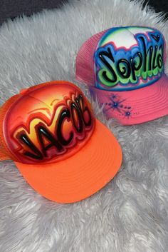 Designs by Galveston Airbrush! ♡ Feel free to contact me with any questions or custom orders. ✧ Our Designs on these Trucker hats are handmade with the artists' skilled Hands and that makes each item unique ✧ My designs are Airbrushed on multicolor trucker hats. Please select desired color from the drop-down menu. Each design includes up to TWO names or words with up to THREE specified COLORS. SIZES: One Size for ADULTS DESIGN PLACEMENT: All designs are airbrushed on the FRONT of our cute hats u Fun Orange Trucker Hat, Fun Orange Adjustable Hat, Artistic Adjustable Trucker Hat, Personalized Snapback Hat For The Beach, Customizable Cap Hats, Adjustable Orange Trucker Hat For Beach, Custom Adjustable Snapback Hat With Flat Bill, Red Customizable Adjustable Hat, Custom Adjustable Snapback Baseball Cap