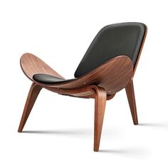 an image of a wooden chair with black leather