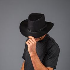 The American outback-style Breeze Sun Hat is the ideal combination of breathable mesh crown and water repellent leather brim. It keeps you cool and dry on the hottest of days and most demanding of adventures. Black Western Hats For Travel, Black Western Style Hats For Travel, Black Wide Brim Panama Hat For Outdoor, Black Western Style Travel Hat, Western Style Black Fedora For Travel, Black Leather Travel Hat, Western Wide Brim Fedora For Outdoor Activities, Western Style Wide Brim Fedora For Outdoor Activities, Black Country Fedora For Outdoor