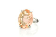 Bringing luster and stunning gemstone realness, this oval ring is a showcase of spectacular elegance and class. A gemstone jewelry piece flaunting a peach Morganite stone set in high-polish prongs. This statement ring is ready to make a buzz. Feminine and beauteous. Alluring style and design. Elegant to wear for special occasions. Can be matched and mixed with other pieces. Comes in a stunning jewelry box. Product specifications Jewelry Information Metal stamp 14K Metal Gold Filled Gem Type Morganite Setting 4 Prong Resizable Yes Stone Information Stone shape Oval Shape Minimum color Orange Cut Checkerboard Cut Stone Creation Method Simulated Stone Treatment Method Not Treated Stone Length 20 millimeters Stone Width 16 millimeters Orange Cut, Morganite Gemstone, Peach Morganite, 14k Rose Gold Ring, Textured Ring, Oval Ring, Oval Rings, 14k Gold Ring, Stunning Jewellery