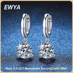 SPECIFICATIONSBrand Name: EWYAItem Weight: *Metals Type: silverMetal Stamp: 925,SterlingOrigin: Mainland ChinaCertificate: YESMain Stone: MoissaniteOccasion: AnniversaryCertificate Type: Third Party AppraisalSide Stone: NoneStyle: TRENDYis_customized: YesEarring Type: drop earringsShape\pattern: GeometricFine or Fashion: FineModel Number: 3 prong moissanite drop earringsGender: Womenearrings: earrings for womenwomen earring: 925 sterling silver earrings certifiedpendientes mujer: jewelry for wom Diamond Drops, 3 Carat, Silver Earring, Diamond Drop Earrings, 925 Sterling Silver Earrings, Moissanite Diamonds, Fine Jewellery Earrings, Earrings For Women, Anniversary Gift