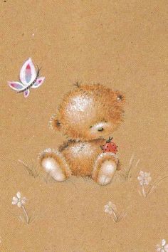 a brown teddy bear sitting on top of a grass covered field next to a butterfly