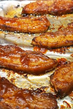 there are several sausages on the pan ready to be cooked