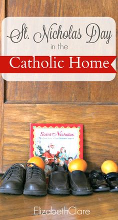 some shoes and an orange are sitting on a shelf in front of a sign that says st nicholas day in the catholic home