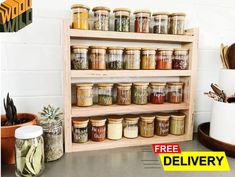 a wooden shelf filled with lots of jars