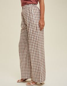 In a classic summer gingham of mocha and cream, the Morgan pants are soft + breezy in a light woven cotton. With a tortoise button closure at the center of the smooth, high-rise waist and finished with side pockets, these billowy trousers are a fun and easy go-to with tees and button-downs alike. 100% cotton 100% rayon lining Shorts length lining Zipper + tortoise button closure Side pockets Soft + airy SMALLwaist - 26"* / hip - 42" / length - 41" / rise - 13" / inseam - 29" MEDIUMwaist - 28"* / Summer Gingham, Gingham Fashion, Gingham Pants, Straight Leg Pant, The Morgan, Curvy Jeans, Curvy Dress, Dress Hats, Cotton Pants