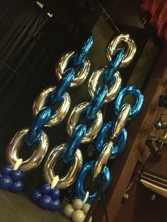 blue and silver balloons in the shape of chains