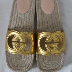 All Of My Items Are Guaranteed 100% Authentic You Are Looking At A Beautiful Designer Pair Of Sandals Made By Gucci Size 39.5 And 40 Heels .75" Leather Uppers And Accented With Cut Out Interlocking Ggs Brand New With Box, Gucci Cards And Dust Bag Gucci Slide Heels, Gucci Perforated G Sandal, Luxury Gold Slip-on Sandals, Designer Gold Sandals With Round Toe, Designer Gold Closed Toe Sandals, Designer Gold Flat Sandals, Gucci Luxury Sandals With Leather Sole, Designer Gold Sandals For The Beach, Gucci Luxury Flat Heel Sandals