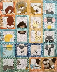 a quilt with many different animals on it