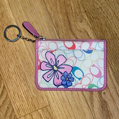 Coach Floral Card Case Wallet With Key Ring - Multi Colored Had For Years And Never Used. Baby Blue Interior In Perfect Condition Pink And Blue Flower Design Vintage Piece And Collection No Tags. Coach Wallet With Zipper Pouch As Gift, Coach Coin Purse With Zipper Closure As Gift, White Coach Wallet For Gift, Coach White Wallet With Zipper Pouch, Coach Flower Wallet, Trendy Pink Coach Wallet, Coach Wallet Blue, Coach Pink Wallet, Elegant Blue Coach Wallet