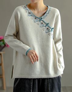 Chinese Style Neck Embroidery Knit Sweater Shirt — Obiono Cotton Long Sleeve Tops With Motif, Winter Long Sleeve Tops With Floral Embroidery, Casual Embroidered Winter Tops, Winter Cotton Top With Floral Embroidery, Casual Fall Tops With Embroidered Hem, Casual Embroidered Cotton Sweater, V-neck Top With Floral Embroidery For Winter, Winter Floral Embroidery Cotton Top, Winter Floral Embroidery Long Sleeve Tops