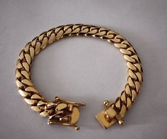 Very impressive authentic Miami Cuban link bracelet, made from solid 18K gold. Made by a Cuban American artist, who specialized in hand crafting Cuban links for over two decades. All our 18K gold Cuban links are made from 18K Plumb (18K+ pure) gold, with ultra high polished finish. Bracelet looks even better in person! Bracelet Specs: - 8.5 inches long. - 11mm wide. - Weight approximately 94.3 grams of solid 18K gold. This is a custom made Cuban links bracelet listing, and the indicated weight i Gold Cuban Link Chain, Cuban Link Bracelet, Miami Cuban Link, Mens Gold Bracelets, Gold Chains For Men, Miami Cuban, Cuban Link Chain, Mens Gold, Cuban Link