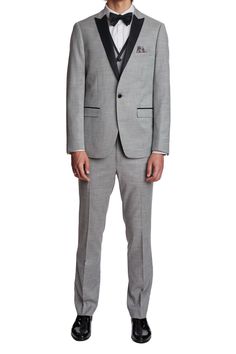 Keep it cool at your next event in this Ice Gray Shark tuxedo jacket. Pair with the matching pants and vest for a polished formal look that's bound to turn heads.PRODUCT DETAILS: style 6185J slim fitting 1 button jacket peak lapel complimentary pocket square side vents poly-rayon stretch blend dry clean only imported Fitted Outerwear With Suit Collar For Black Tie Event, Winter Black Tie Tuxedo Suits, Fitted Tuxedo Style Outerwear, Winter Black Tie Tuxedo With Notch Lapel, Winter Black-tie Event Suits With Suit Collar, Fitted Tuxedo Outerwear With Suit Collar, Formal Tuxedo Suit For Winter, Tailored Winter Blazer For Black Tie Events, Tailored Blazer For Black Tie Winter Events