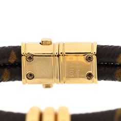 This is an authentic LOUIS VUITTON Monogram Keep It Twice Bracelet size 19. This bracelet has a rolled loop of signature mini monogram toile canvas with brass clasp hardware and a brass lock charm. Twice Bracelet, Bracelet Sizes, Authentic Louis Vuitton, Louis Vuitton Monogram, Monogram, Louis Vuitton, Brass, Bracelet, Canvas