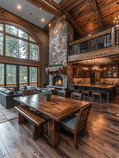 a large living room filled with furniture and a fire place in the middle of it