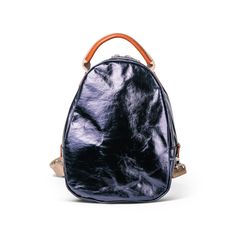 Petite and perfect in every way, the Olli is your go to mini backpack. Its compact size & style makes for a strong fashion statement and it will function perfectly as a daily bag to carry all of your essentials. Washable Paper, Daily Bag, Classic Backpack, Shape And Form, Designer Backpacks, Mini Backpack, Fashion Statement, Fashion Backpack, Water Resistant