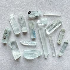 Let these gorgeous aquamarine stones sweep you away to a tranquil, blue-green sea! Each stone shares the characteristic light blue color of aquamarine, as well as a high level of clarity and well-formed hexagonal crystal structure. Several also have black tourmaline inclusions. Any of them would be great to add to your gem/mineral/crystal collection, or for making into jewelry. Though I am not an expert, these stones are completely natural and untreated as far as I can tell. Aquamarine is the main birthstone for March. I have FREE informational cards for these stones! They include the name of the stone, general mineral information, and metaphysical crystal properties. Limit one per type of stone in your order (ex. if you order 2 blue lace agate stones, 1 rough ocean/sea/orbicular jasper st Green Sea, Aquamarine Stone, Blue Lace Agate, Pink Gemstones, Jasper Stone, Natural Aquamarine, Light Blue Color, Crystal Collection, Agate Stone