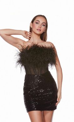 Fashion-forward, this closed-back corset dress combines sequins, feathers, and sheer details for a short, strapless, sparkly statement piece. Glamorous Feather Trim Mini Dress For Costume Party, Glamorous Mini Dress With Feather Trim For Costume Party, Glamorous Sequin Feather Dress For Night Out, Strapless Club Dress With Feather Trim, Glamorous Feathered Sequin Dress For Night Out, Glamorous Strapless Dress For Costume Party, Party Dress With Feather Trim And Fitted Bodice, Strapless Club Dress With Feathers, Black Strapless Dress With Feathers