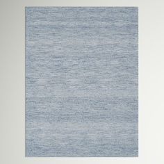 an area rug with blue and white colors