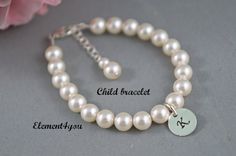 Child bracelet flower girl bracelet Initial charm by Element4you, $22.95 White Name Bracelets For Wedding, Personalized White Bracelets For Wedding, Personalized Round Bead Pearl Bracelet In Elegant Style, Classic White Charm Bracelet As Gift, Classic White Charm Bracelet Gift, Personalized Classic Pearl Bracelet, Personalized Pearl Bracelet, Elegant White Name Bracelets, Elegant Name Charm Bracelet For Wedding