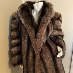 This Is A One Of A Kind Fur Coat In Excellent Condition. No Signs Of Wear And Tear. Front Hook Closure.