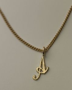 "Personalized 14k solid gold initials necklace. Simple, minimalist everyday necklace Perfect wearing alone or layering with your favorite necklaces. Each initial measures approx. 6.5mm, You can add up to 5 Initials Chain Length: 18\" Available in 14K Yellow Gold or 14K White Gold * Leave us your initials and placement in the comment box at checkout." Initial Pendant Necklace With Curb Chain, Dainty Charm Necklaces With Curb Chain For Gifts, Gift Necklace With Initial Pendant And Curb Chain, Initial Pendant Jewelry With Curb Chain For Gift, Gift Jewelry With Initial Pendant And Curb Chain, Yellow Gold Name Necklace With Curb Chain As Gift, 14k Yellow Gold Name Necklace With Curb Chain, 14k Gold Name Necklace With Curb Chain As Gift, 14k Gold Initial Necklace