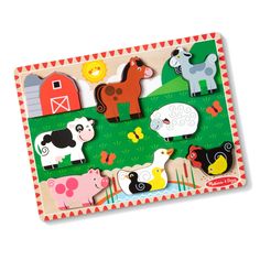 a wooden puzzle with farm animals on it