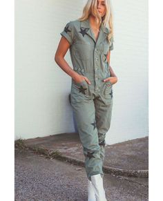 The Grover is our bestselling jumpsuit with a button front closure.Our most-loved workwear-inspired one piece comes in an army green color. With adjustable straps on the side, the Grover can be worn cinched at the waist or straight for a looser fit. Rise: 11 1/4" | Inseam: 28"Measurements taken from size Small For a tighter fit, please size down. XXS= 00-0, XS= 0-2, S= 2-4, M= 6-8, L= 10-12, XL= 14, XXL=16 100% Cotton Wash coldImported Tap Dance Photography, Short Sleeve Denim Jumpsuit, Army Green Color, Dance Photography, Petite Outfits, Denim Jumpsuit, Army Green, Green Color, Military Jacket