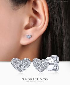 Carry love with you always when you wear these luminous heart shaped diamond earrings. Brilliant 0.11ct pavé diamonds completely encrust each 14k white gold piece. These simple yet meaningful heart earrings are an ideal gift for the one you love.  EG13079W45JJ #Earrings #FashionEarrings #FineJewelry#FashionJewelry#UniqueJewelry#GiftIdeas#UniqueGifts  #DiamondJewelry #Jewelry  #GabrielNY #DiamondJewelry #FineJewelry #GabrielAndCo #UniqueJewelry Heart Shaped Diamond Earrings, Unique Diamond Earrings, Jewellery Shop Design, Classic Earrings, Diamond Earring, Heart Shaped Diamond, Gold Piece, Diamond Stud Earrings, Silver Plated Jewelry