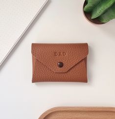 Our leather coin pouch is the perfect accessory to show your personal style.  This handmade leather wallet combines craftsmanship, functionality and beauty in the little things. Handmade in our small workshop with full grain leather.  This personalized coin purse is super functional, in it you can carry coins, cards, bills or keys. You'll use it to keep all your essentials with you.  Details: - Available in leather in 14 different colors. - Approximate dimensions: 10cm x 7cm (3,94" x 2,75") - Yo Minimalist Brown Wallets As Gift, Leather Envelope Coin Purse As Gift, Minimalist Leather Coin Purse For Gift, Minimalist Leather Coin Purse As Gift, Minimalist Bifold Coin Purse As Gift, Classic Envelope Coin Purse Gift, Minimalist Leather Trifold Wallet Gift, Brown Minimalist Card Holder For Gift, Minimalist Trifold Wallet With Coin Pocket