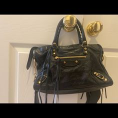 Classic City Bag From Balenciaga With Gold Hardware Still Sold Everywhere Black Balenciaga, Bags Black, Balenciaga Bag, City Bag, Balenciaga City Bag, Vintage Accessories, Gold Hardware, Balenciaga, Bag Lady