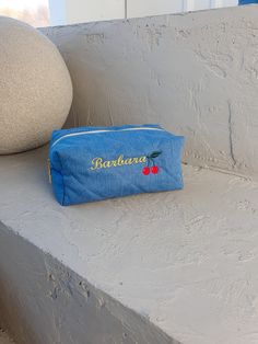 Custom Embroidery Makeup Bag, Quilted Denim Makeup Bag with Personalization, Toiletry Bag with Name, Travel Makeup Bag, Personalized Bridesmaid Gifts. This custom embroidery makeup bag stands out not only for its practicality but also for its exceptional design. Quilted denim makeup bag with personalization is sewn from high-quality blue denim, providing you with both durability and a touch of style to enhance your everyday beauty rituals. It's practical and stylish travel makeup bag - ideal for carrying makeup, pencils, or any must-have you need to go.   This toiletry bag with name It's a practical and memorable gift for bridesmaid or mother's day,  Handcrafted with care and precision, this bag serves as a luxurious home for all your beauty essentials. This toiletry bag with embroidered n Blue Denim Bag With Zipper Pouch, Blue Cosmetic Pouch Bag For Personal Use, Everyday Blue Bag With Embroidered Logo, Blue Embroidered Rectangular Pouch, Trendy Blue Cosmetic Bag For School, Trendy Blue Cosmetic Bag For Gift, Blue Embroidered Denim Bags, Blue School Pouch With Zipper Closure, Trendy Blue Pouch For Personal Use