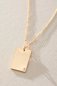 So unique in an understated design, this stunning necklace features a personalized rectangle pendant with initial engraved at corner for a super fun finishing touch. * 14k Gold Filled * 0.5x0.75" rectangle bar necklace with hand-stamped personalization * Length: 20" * 5 days of production | Set & Stones Personalized ie Necklace at Free People in Gold Rectangular Monogram Jewelry For Anniversary, Minimalist Rectangular Name Necklace For Gifts, Classic Rectangular Jewelry For Personalized Gifts, Personalized Gift Rectangular 14k Gold Jewelry, Minimalist Personalized Initial Necklace, Elegant Everyday Nameplate Initial Necklace, Elegant Name Necklace With Rectangular Pendant, Elegant Rectangular Pendant Initial Necklace For Everyday, Minimalist Yellow Gold Initial Nameplate Necklace