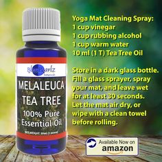 an advertisement for melaleuca tea tree essential oil on a wooden table with the words melaleuca tea tree essential oil