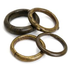 Dowry Wealth Currency Bangles from Nigeria Set of Four Bangles Approx ages: 19th to Early 20th Century Material: Brass and Bronze all with significant wear from decades of use and love. SOLD AS A SET OF FOUR ONLY Vintage Hand Cast Bronze Bracelets, Antique Finish Bangle Jewelry, Antique Style Bangle With Antique Finish, Antique Jewelry Bangle With Antique Finish, Adjustable Heirloom Bracelet For Ceremonial Occasion, Heirloom Adjustable Bracelets For Ceremonial Occasions, Adjustable Heirloom Ceremonial Bracelet, Heirloom Style Adjustable Ceremonial Bracelet, Heirloom Ceremonial Bracelet Jewelry