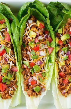 three lettuce wraps filled with ground beef and vegetables