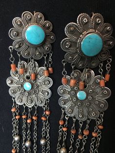 "Earrings ~ Afghanistan, Antique pair of earrings, Silver, Coral and Turquoise. 1930s early to mid 20th century. Length: 6\" Width: 1 3/4\" Tribal Silver Such an Amazing Find. Yes ~ along with basic simplicity ~ It's all about you You deserve to know about my fabulous Treasure chest HeartbeatHandmade and Big Sur Jade Treasures both (Etsy sites) Tribal Jewelry, Statement Piece Jewelry, Art to Wear Jewelry, Fantastic Fine Leather Beaded Handbags, an array of treasures for the traveler and mystic w Vintage Chandelier Earrings With Intricate Design, Antique Dangle Earrings For Vintage Collection, Vintage Turquoise Jewelry With Intricate Design, Antique Dangle Earrings From Vintage Collection, Collectible Bohemian Earrings, Bohemian Collectible Earrings, Vintage Turquoise Round Earrings, Bohemian Drop Earrings For Vintage Collection, Bohemian Vintage Drop Earrings