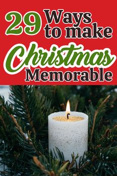 a candle with the words 29 ways to make christmas memorable on it, surrounded by evergreen branches