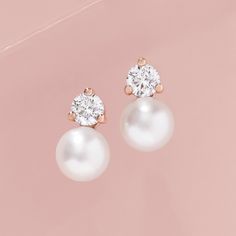 Made of solid 14k gold (not plated, not filled, not vermeil), these earrings are available in your choice of yellow, white, or rose gold (as well as platinum upon request) Adorned with genuine freshwater cultured pearls and sparkling diamonds together creating the perfect balance of sophistication and sparkle Available in three sizes, 0.12ctw, 0.20ctw, and 0.50ctw - scroll down for dimensions and further specifications Meticulously crafted, these earrings are elegant with an modern twist. Delivered in a beautiful gift box these earrings make the perfect for your nearest and dearest. Diamond & Pearl Stud Earrings Metal: 14K Solid Gold or Platinum Diamond Quality: G color, VS clarity Gemstone: White Freshwater Cultured Pearl Closure: Friction Back Sold as pair. Available Sizes: 0.12ctw Lengt Luxury Rose Gold Drop Pearl Earrings, Luxury Rose Gold Pearl Drop Earrings, Classic Rose Gold Earrings For Everyday Luxury, Delicate White Diamond Earrings For Formal Occasions, Refined 14k Gold Wedding Earrings, Elegant Rose Gold Diamond Earrings With Brilliant Cut, Elegant Rose Gold Diamond Earrings, Classic Bridal Earrings In 14k White Gold, Refined 14k Gold Earrings For Anniversary