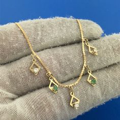 * Gorgeous Italian 14k Yellow Gold Diamond Emerald S Link 16.5" Chain Necklace * Metal: 14k Yellow Gold * Stone(s): (3) Round Cut Diamond, (2) Round Cut Emerald * Diamonds measure: approximately 2.5 mm each * Emeralds measure: approximately 2.1 mm each * Length: 16 1/2" * Chain Width: 1.2 mm * Weight: 3.9 tgw * Markings: ITALY * 14k * 585 * Condition: As pictured.  * G21344% Restocking Fee    Exported By ExportYourStore :) Yellow Gold Diamond Cut Jewelry For May Birthstone, Gold Emerald Necklace With Diamonds For May Birthstone, Gold Emerald Necklace With Diamond Cut In 14k Gold, Gold Emerald Necklace With Diamond Cut As A Gift, Gold Emerald Necklace With Diamond Cut For Gift, 14k Gold Necklace With May Birthstone, Gold 14k Emerald Necklace For Anniversary, Gold Emerald Necklace In 14k Gold For Anniversary, Gold Emerald Necklace For Anniversary