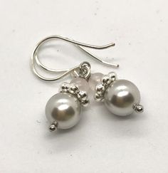 Feminine Pearl Earrings In Silver, Silver Feminine Pearl Earrings For Anniversary, Feminine Silver Pearl Earrings For Anniversary, Feminine Silver Pearl Earrings, Feminine Silver Pearl Drop Earrings, Feminine Silver Earrings For Anniversary, Casually Elegant, Faux Pearl Earrings, Quartz Rose