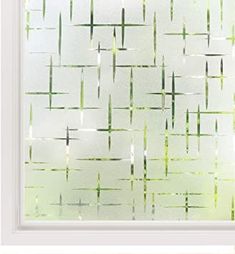 an abstract painting with green and white lines on the bottom half of it, in a white frame