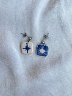 Earrings are made from stainless steel components and ceramic pendants. Those charms are hand-painted with cobalt blue underglaze paint and then set with transparent glaze. Ceramic Lighthouse, Ceramic Pendants, Earrings Ceramic, Ceramic Earrings, Ceramic Earring, Silver Sparkle, Ceramic Pendant, Ceramic Jewelry, Blue Ceramics