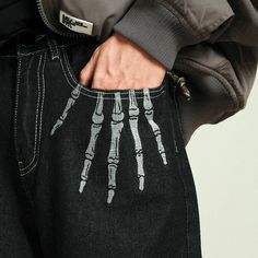 Crafted from soft denim fabric, these Skeleton Hand Embroidery Pants boast a striking mid-waist look and come with a durable zipper closure. DETAILSMaterial: DenimClosure Type: Zipper flyWaist Type: MID Gray Skeleton Pants, Rhinestone Skeleton Jeans, Straight Baggy Jeans, Alternative Fashion Outfits, Mens Casual Jeans, Embroidery Pants, Body Dimensions, Denim Pants Mens